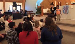 Reading a story as a part of the Confirmation service at Nativity, Burnsville this past weekend